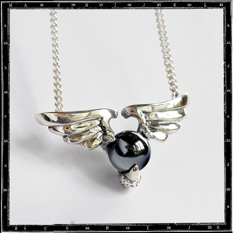 Winged stone  pendant
