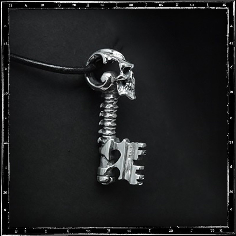 Skull key pendant