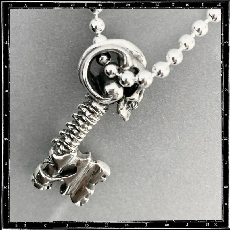 Skull key pendant