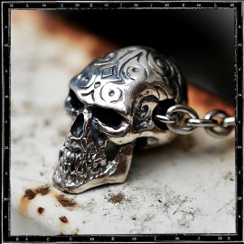Engraved skull pendant