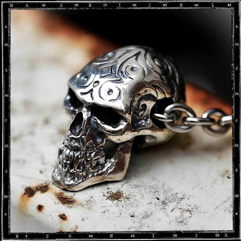 Engraved skull pendant