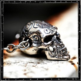 Engraved skull pendant