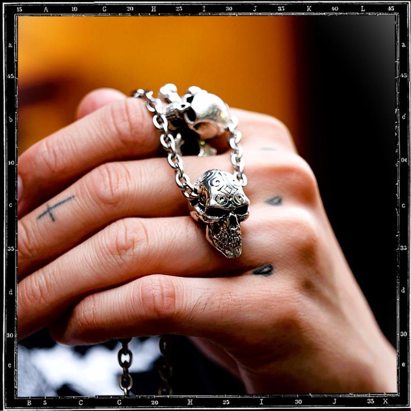 Engraved skull pendant
