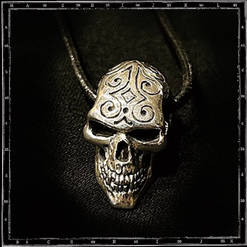 Engraved skull pendant